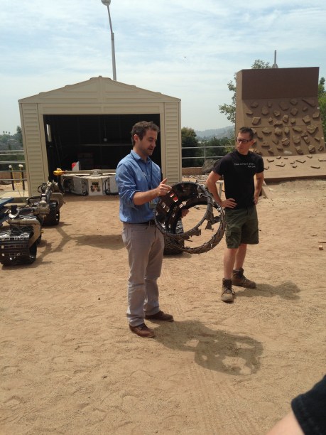 Kevin Hand is a Geobiology alumni, and now Deputy Chief Scientist, Solar System Exploration Directorate. He is showing us how the mars rover's wheels are getting shredded on rocks of mars. Remarkably, they still provide sufficient thrust to stay functional.